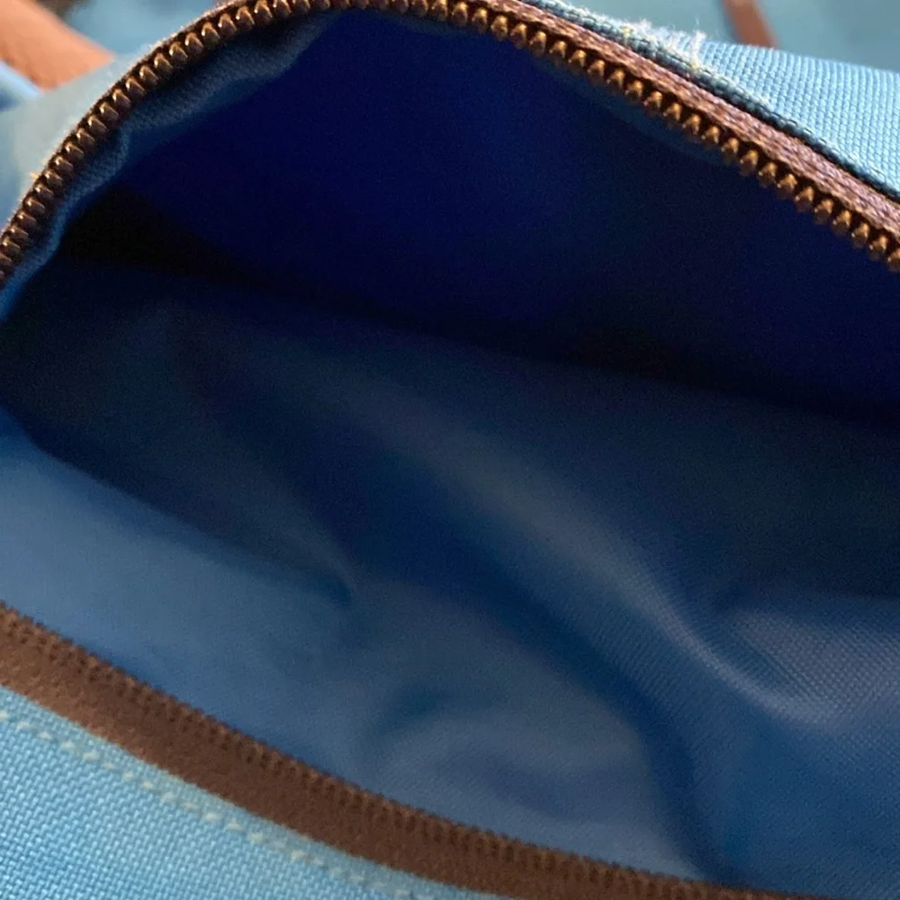 Patagonia Blue Messenger Bag with Reflective Accent